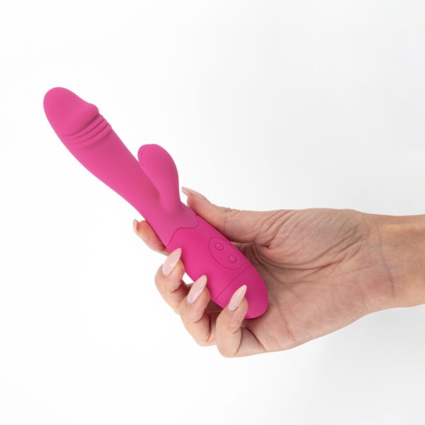 VIBRADOR RECARGABLE CON ESTIMULADOR DE CLÍTORIS BLOSSOMS ROSA FUERTE Y LUBRICANTE DE BASE AGUA INCLUIDO CRUSHIOUS - Imagen 9