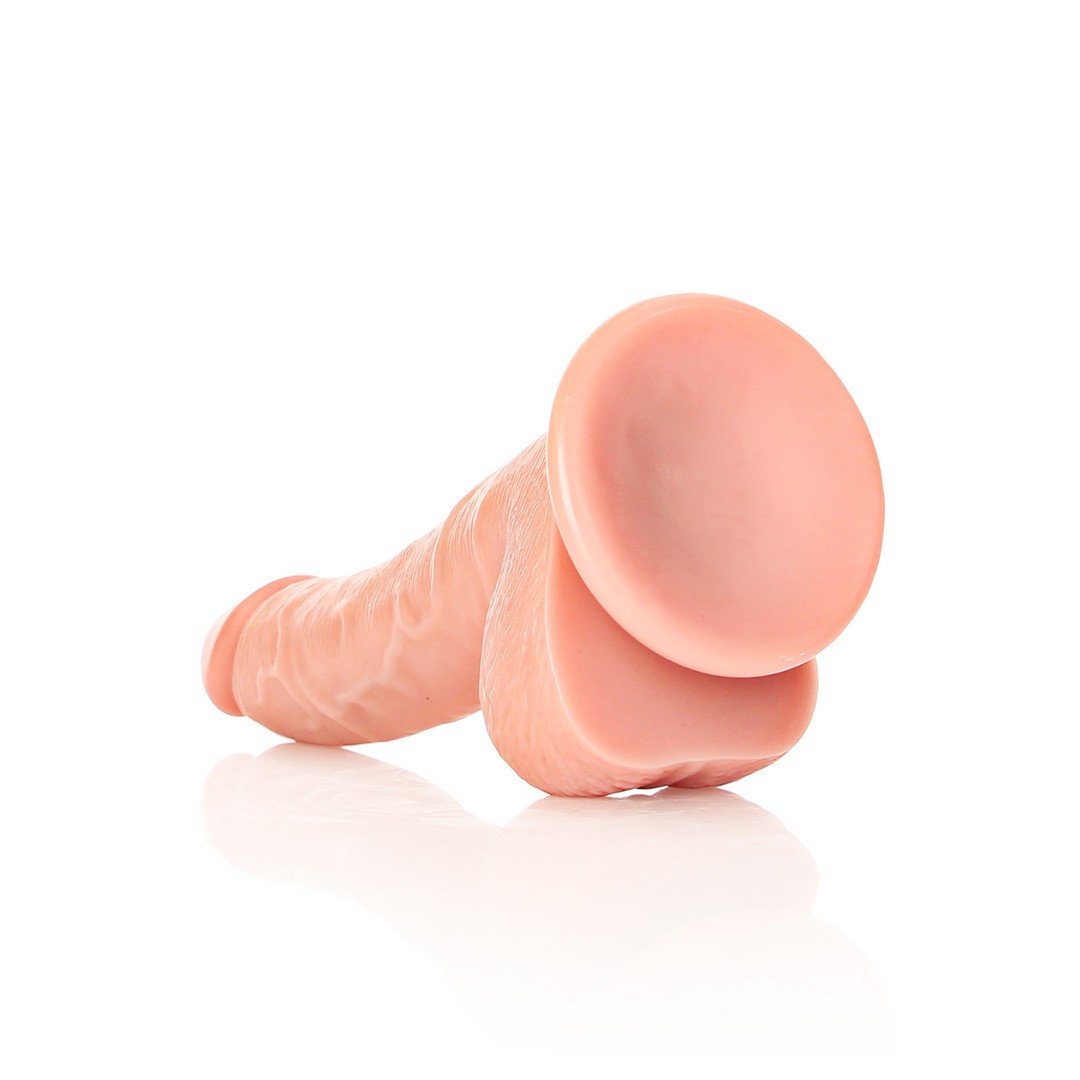 DILDO REALISTA CON TESTICULOS CURVED 7 /18CM FLESH REALROCK - Imagen 5